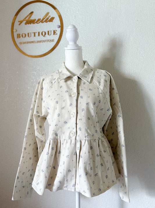 Jacket de sarga con estampado floral peplum
